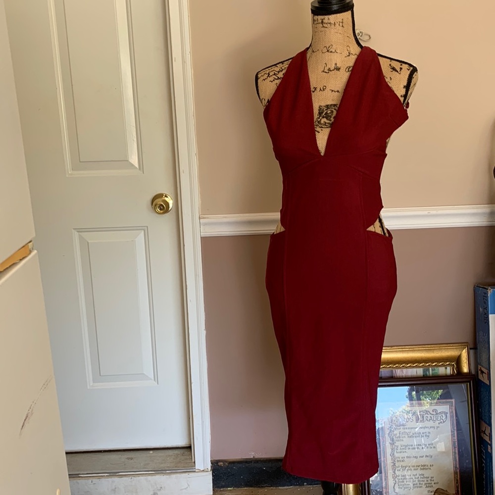 Get this sexy dress today. Gorgeous dress, size 10 burgundy body shaper, .